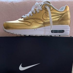 Gold and white custom Nike sneakers